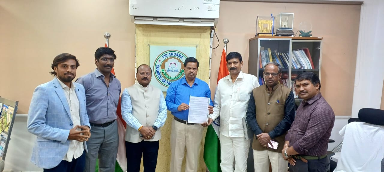 The team presenting a letter to an official